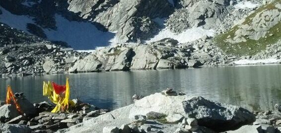 Snow-covered peaks reflected in Dam Ghodi Lake